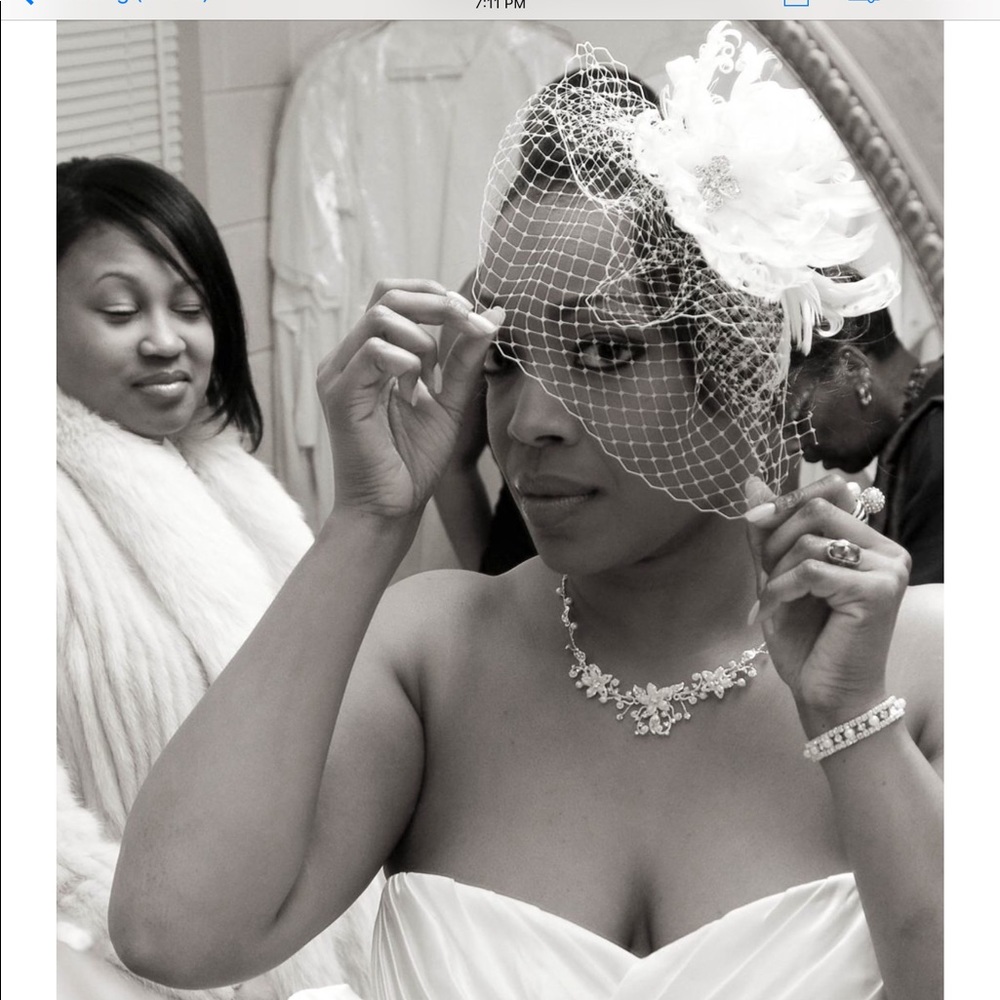 Ivory Swarovski crystal and feather Fascinator